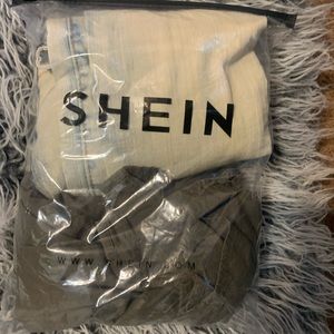 Button up and ripped acid wash jeans